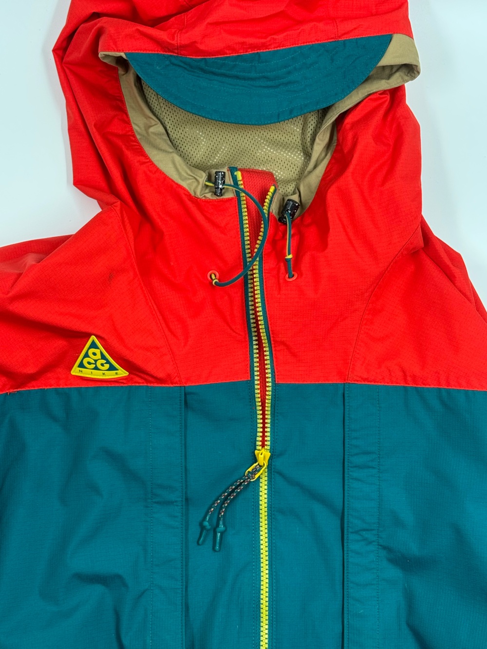 Nike ACG Red and Teal Colorblock Hooded Jacket with Yellow Accents